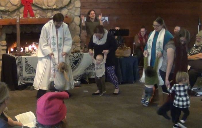 The Gate Opening, with kids spinning the Gates open
